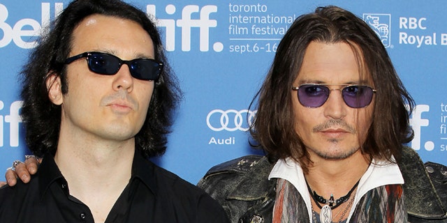 Sept. 8, 2012: This image released by Starpix shows Damien Echols, one of the West Memphis Three, left, and actor Johnny Depp at a press conference for the film "West of Memphis" at the 2012 Toronto International Film Festival in Toronto.