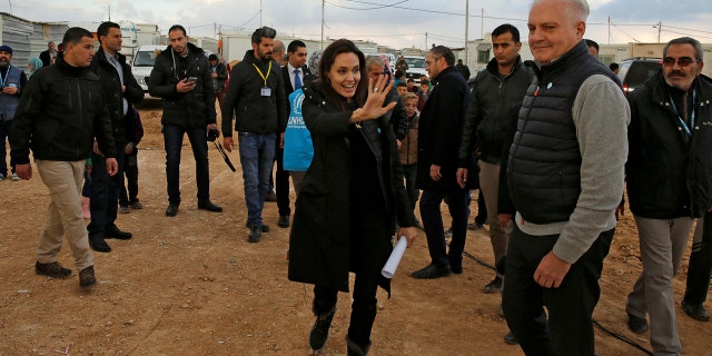 Actor Angelina Jolie, UNHCR Special Envoy, walks during her visit Al Zaatri refugee camp, in the Jordanian city of Mafraq, near the border with Syria, January 28, 2018. REUTERS/Muhammad Hamed - RC1C93A37CC0