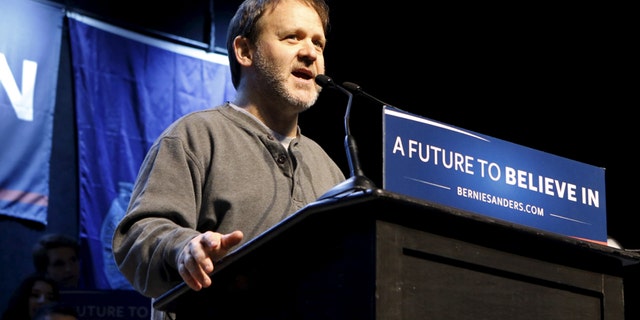 Jon Fishman, drummer in the band Phish, introduces U.S. Democratic presidential candidate and U.S. Senator Bernie Sanders at a campaign rally in Portland, Maine March 2, 2016.