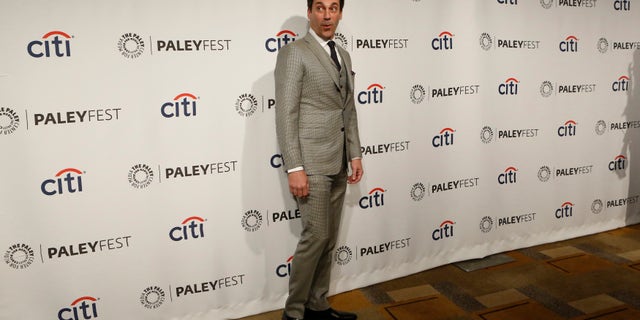March 21, 2014. Cast member Jon Hamm poses as he arrives for a panel discussion for the television series "Mad Men" during the The William S. Paley Television Festival at the Dolby theatre in Hollywood, California.