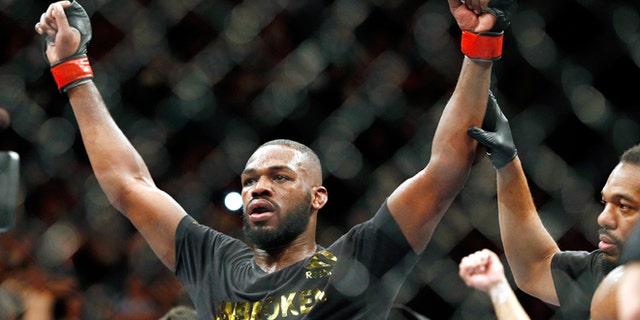 This Jan. 3, 2015, file photo shows Jon Jones celebrates after defeating Daniel Cormier during their light heavyweight title mixed martial arts bout in Las Vegas.
