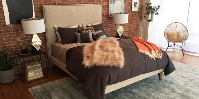 Scott's incorporates fall/winter design elements to bring a cozier feel to the bedroom.