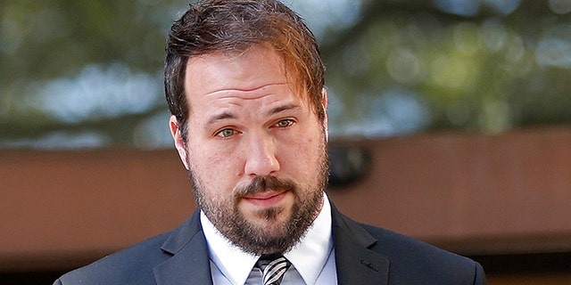 Jordan Hamlett, left, leaves federal court with his attorney Michael Fiser, following his guilty plea in Baton Rouge, La., Monday, Dec. 11, 2017. The Louisiana private investigator pleaded guilty in his alleged attempts to access Donald Trump's tax returns during the presidential campaign. Authorities have said Hamlett failed in his attempts to get Trump's tax returns through a U.S. Department of Education financial aid website. The 32-year-old Lafayette resident was charged with misusing a Social Security number. His trial had been scheduled to start this week, but the judge originally assigned to the case died Saturday. (AP Photo/Gerald Herbert)
