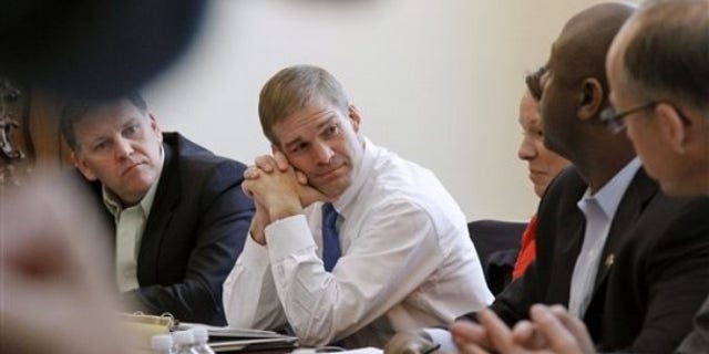 FILE: Nov. 9, 2010: Rep. Jim Jordan, center, meets with other House Republicans on Capitol Hill, in Washington, D.C.