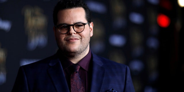Cast member Josh Gad poses at the premiere of "Beauty and the Beast" in Los Angeles, California, U.S. March 2, 2017. REUTERS/Mario Anzuoni - RTS118WW