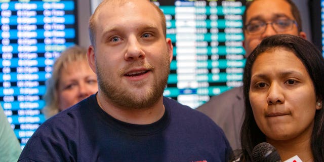 Josh Holt returned home with his wife, Thamara Candelo, on Monday after spending nearly two years in a Venezuelan jail.