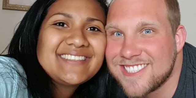 Thamara Caleño, left, and her husband, Joshua Holt.