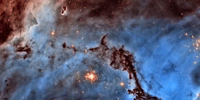This photo of the star-forming region NGC 1763 was created with data from the Hubble Space Telescope archive by Josh Lake. Lake won first prize in the image processing category in the 2012 contest to unearth Hubble's hidden treasures.