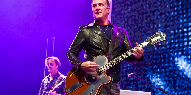 Josh Homme of Queens of the Stone Age performs at the 2017 KROQ Almost Acoustic Christmas at The Forum on Saturday, Dec. 9, 2017, in Inglewood, Calif. (Photo by Amy Harris/Invision/AP)