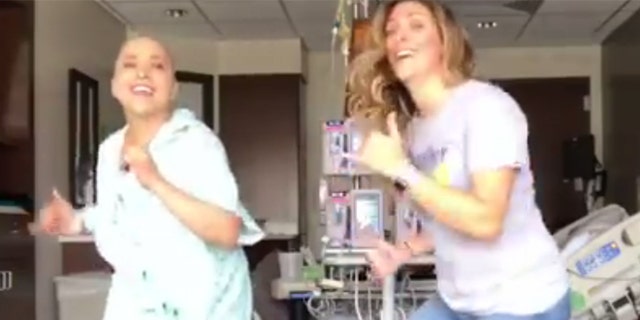 Ana-Alecia Ayala, left, and her dance partner have gone viral for their 'Juju on That Chemo' dance.