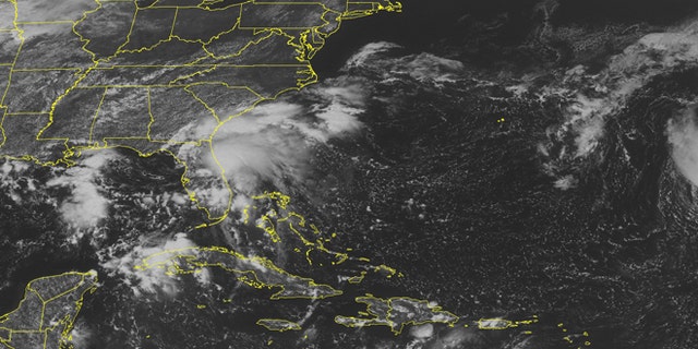 This NOAA satellite image taken Tuesday, Sept. 13, 2016, at 9:45 AM EDT shows a cold front over the Great Lakes and the Mid-Mississippi Valley. Along the front is a developing storm that is producing areas of rain. A strong area of high pressure over the Eastern United States, will direct the storm to the Northwest. This will keep the clear weather conditions over the east. Over Florida is a surface low pressure system that is developing tropical like characteristics. The low should move the Northwest and develop rain and gusty winds in its path. (Weather Underground via AP)