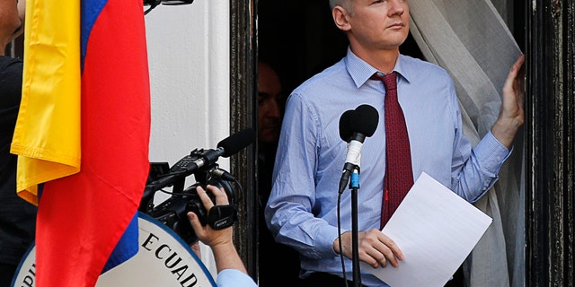 Wikileaks founder Julian Assange arrives to speak from the balcony of Ecuador's embassy, where he is taking refuge in London August 19, 2012.