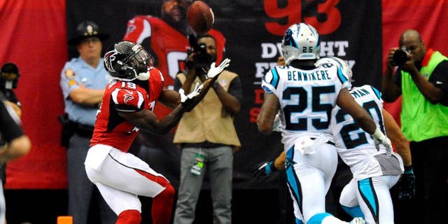 Atlanta Falcons wide receiver Aldrick Robinson (19) makes a touchdown reception past Carolina Panthers strong safety Kurt Coleman (20) and cornerback Bene' Benwikere (25) in the second half on Sunday, Oct. 2, 2016 at the Georgia Dome in Atlanta, Ga. Atlanta won 48-33. (David T. Foster III/Charlotte Observer/TNS)