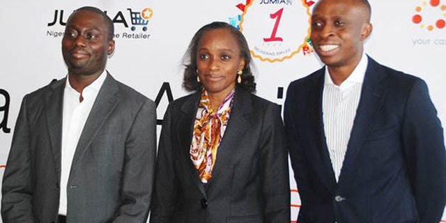 Rapheal Afeador (left) and Tunde Kehinde (right), co-founders and managing directors of Jumia, flank Omobola Johnson, Nigeria's minister of communications and technology, at the first e- commerce conference in Nigeria.