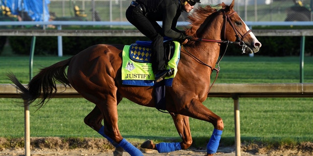 An exercise rider works out Kentucky Derby hopeful Justify at Churchill Downs in Louisville, Kentucky, U.S., May 1, 2018.