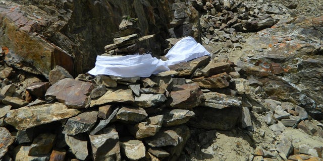 The bodies located by the team will remain on the mountain under makeshift memorials, but DNA testing will help their loved ones find peace knowing they received a burial. (Sequoia Di Angelo)