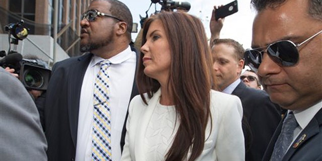 Aug. 8, 2015: Pennsylvania Attorney General Kathleen Kane arrives to be processed and arraigned on charges she leaked secret grand jury material and then lied about it under oath at the Montgomery County detective bureau in Norristown, Pa.