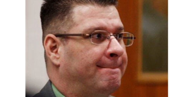 April 6, 2012: Adam Longoria watches the jury enter the courtroom during his trial in Barton County District Court in Great Bend, Kan.
