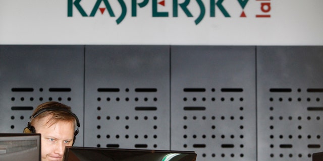 An employee works near screens in the virus lab at the headquarters of Russian cyber security company Kaspersky Labs in Moscow, July 29, 2013.