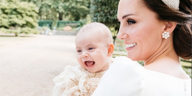 The Duchess of Cambridge poses with her son Prince Louis.