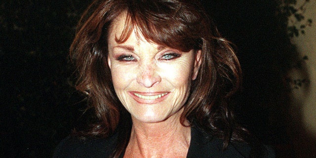 Oct. 6 1998. British actress Kate O'Mara poses for photographers. Actress Kate O'Mara, best known for her role in the 1980s soap opera "Dynasty," has died at the age of 74.