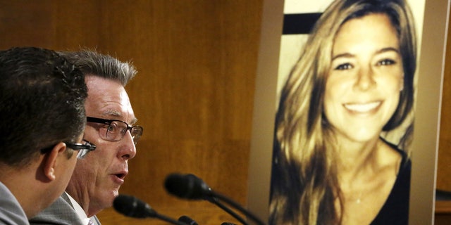 Jim Steinle (L), father of murder victim Kathryn Steinle (in photo, R), allegedly at the hands of an undocumented immigrant, testifies about his daughter's murder during a hearing of the Senate Judiciary Committee on U.S. immigration enforcement policies, on Capitol Hill in Washington July 21, 2015. REUTERS/Jonathan Ernst TPX IMAGES OF THE DAY - GF10000165913
