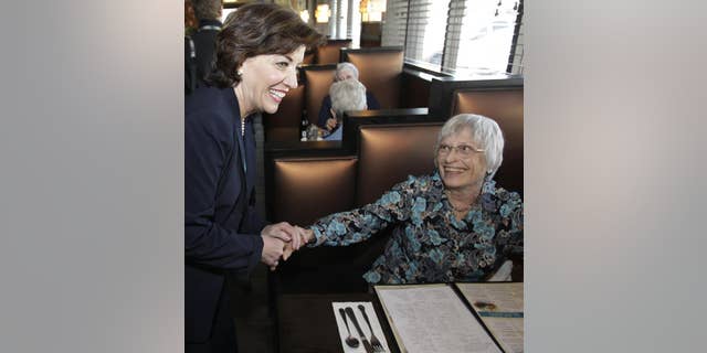Congresswoman-elect Kathy Hochul, D-NY, left, thanks customers for their support at a restaurant in Depew, N.Y., Wednesday, May 25, 2011. (AP Photo/David Duprey)