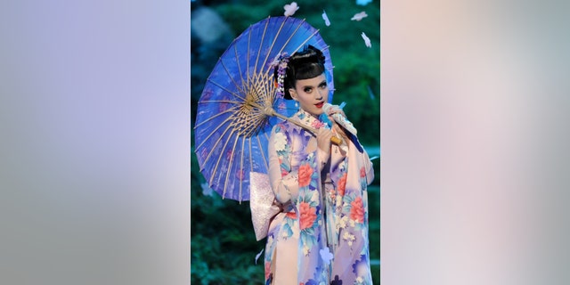 Nov. 24, 2013 file photo, Katy Perry performs on stage at the American Music Awards at the Nokia Theatre L.A. Live in Los Angeles.
