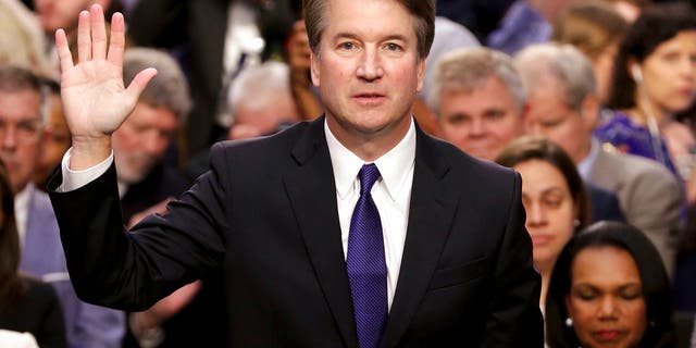 President Donald Trump's Supreme Court nominee Brett Kavanaugh is sworn-in before the Senate Judiciary Committee on Capitol Hill in Washington, Tuesday, Sept. 4, 2018, to begin his testimony in his confirmation hearing to replace retired Justice Anthony Kennedy.. (Chip Somodevilla/Pool Photo via AP)