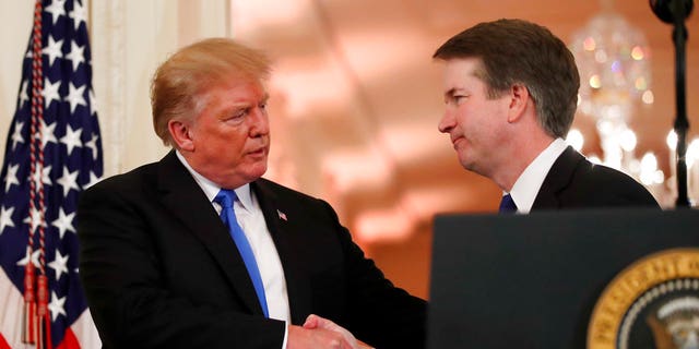 President Donald Trump shakes hands with Judge Brett Kavanaugh his Supreme Court nominee, in the East Room of the White House, Monday, July 9, 2018, in Washington.   (AP Photo/Alex Brandon)