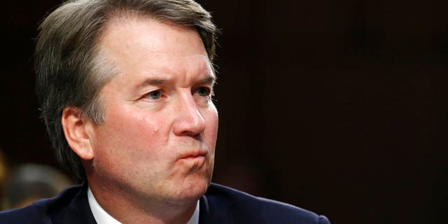 President Donald Trump's Supreme Court nominee, Brett Kavanaugh, listens to a question during the third round of questioning on the third day of his Senate Judiciary Committee confirmation hearing, Thursday, Sept. 6, 2018, on Capitol Hill in Washington, to replace retired Justice Anthony Kennedy. (AP Photo/Jacquelyn Martin)
