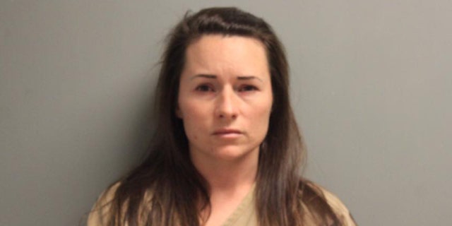 Mugshot for Kayla Coutee, 31, charged with fatally shooting her estranged husband Saturday in Louisiana.