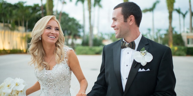 Kayleigh and her husband Sean on their wedding day.