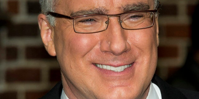 FILE - In this Oct. 24, 2011 file photo, political pundit Keith Olbermann leaves a taping of the "Late Show with David Letterman," in New York. Olbermann sued his former bosses at Current TV in Los Angeles on Thursday, seeking more than $50 million for breach of contract and other claims. His case claims his show for the network was fraught with technical problems and he was fired without cause. (AP Photo/Charles Sykes, file)