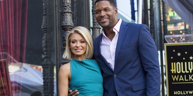 Kelly Ripa and Michael Strahan celebrate her star on the Hollywood Walk of Fame in 2015.