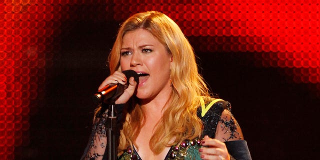 December 16, 2012. Kelly Clarkson performs during the VH1 Divas show in Los Angeles.