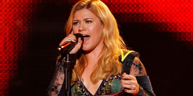 December 16, 2012. Kelly Clarkson performs during the VH1 Divas show in Los Angeles.