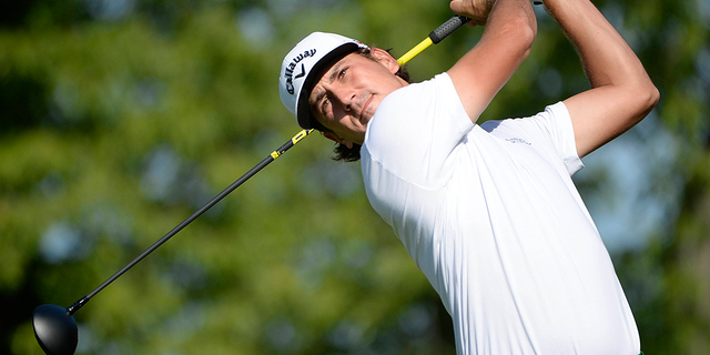 Kelly Kraft plays his tee shot on the tenth hole during the first round of the RBC Canadian Open golf tournament at Glen Abbey Golf Club