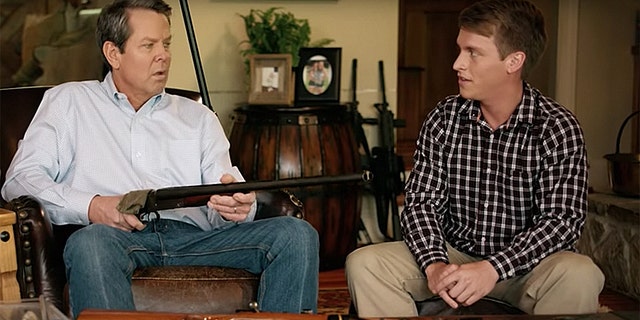 Brian Kemp's new political ad of him holding a double-barrel shotgun has caused an uproar.