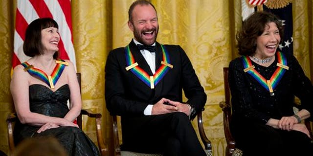 The 2014 Kennedy Center Honors Honorees ballerina Patricia McBride, from left, singer-songwriter Sting, and comedienne Lily Tomlin, laugh during a reception in their honor in the East Room of the White House in Washington, Sunday, Dec. 7, 2014, hosted by President Barack Obama and first lady Michelle Obama. (AP Photo/Manuel Balce Ceneta)