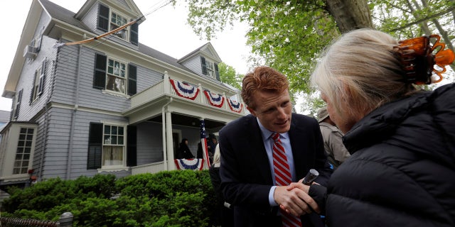 U.S. Rep. Joe Kennedy III greets a well-wisher during ceremonies on the 100th anniversary of the birth of his great-uncle, President John F. Kennedy, outside the home where JFK was born, in Brookline, Mass., May 29, 2017.