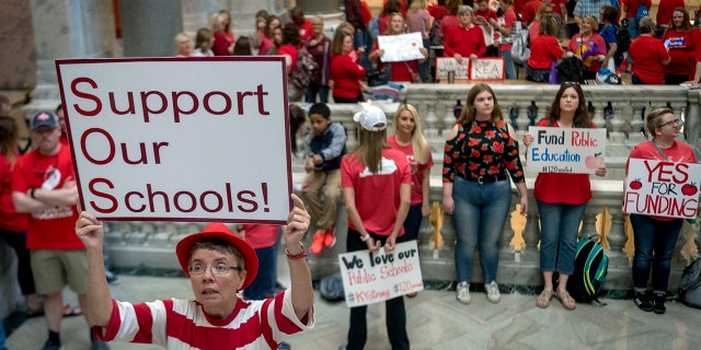 Teachers from across Kentucky gather at the state Capitol in Frankfort to rally for increased funding for education, April 13, 2018.