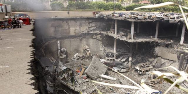 FILE: Sept. 26, 2013: This image shows the collapsed upper car park of the Westgate Mall in Nairobi, Kenya.