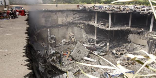 FILE: Sept. 26, 2013: This image shows the collapsed upper car park of the Westgate Mall in Nairobi, Kenya.