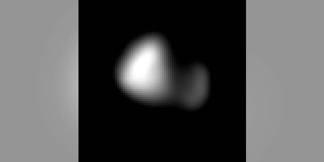 This image of Kerberos was created by combining four individual Long Range Reconnaissance Imager pictures taken on July 14, approximately seven hours before New Horizons’ closest approach to Pluto, at a range of 245,600 miles from Kerberos. Kerberos appears to have a double-lobed shape, approximately 7.4 miles across in its long dimension and 2.8 miles in its shortest dimension. (NASA/Johns Hopkins University Applied Physics Laboratory/Southwest Research Institute)