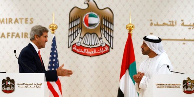 Nov. 11, 2013: U.S. Secretary of State John Kerry reaches out to shake hands with U.A.E. Foreign Minister Abdullah bin Zayed Al Nahyan in Abu Dhabi. The U.A.E. is one of the biggest buyers of U.S. arms.
