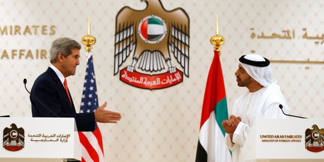 Nov. 11, 2013: U.S. Secretary of State John Kerry reaches out to shake hands with U.A.E. Foreign Minister Abdullah bin Zayed Al Nahyan in Abu Dhabi. The U.A.E. is one of the biggest buyers of U.S. arms.