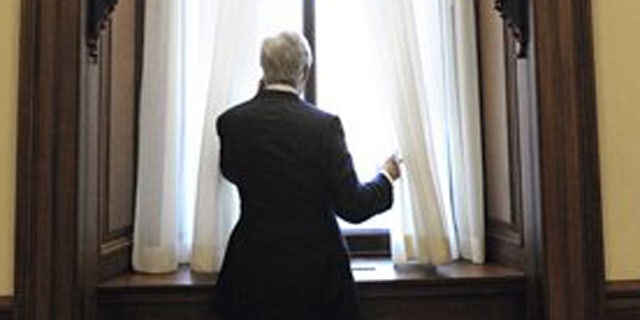 Secretary of State nominee Sen. John Kerry, D-Mass. makes a telephone call on the House side of the Capitol in Washington, Thursday, Jan. 3, 2013. Kerry has started meeting with diplomatic staff to prepare for his confirmation. (AP Photo/Cliff Owen)
