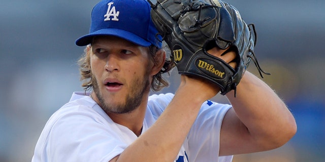 Aug. 16, 2014: Los Angeles Dodgers pitcher Clayton Kershaw winds up during a baseball game against the Milwaukee Brewers in Los Angeles.