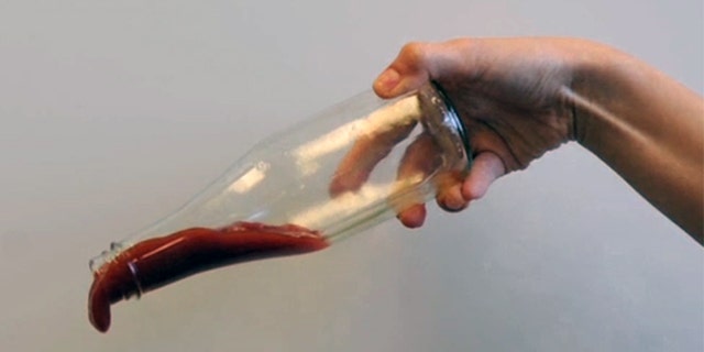 MIT researchers have developed a new surface that adds lubrication to containers to make thicker food substances flow out easily.